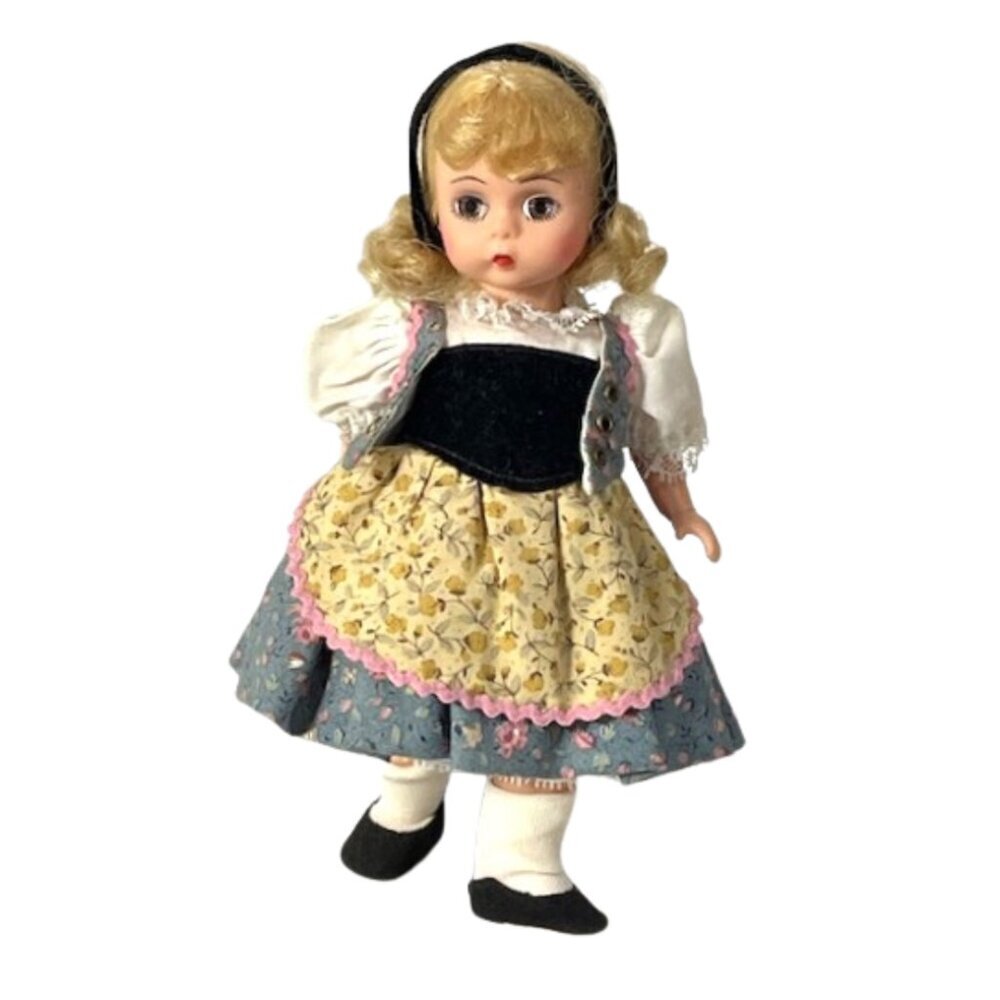 Madame Alexander restrung 8" Goldilocks doll with stand.